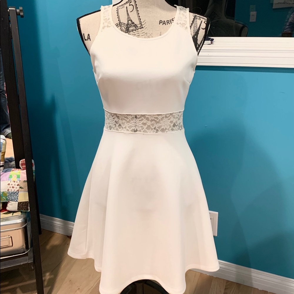 White sleeveless skater dress